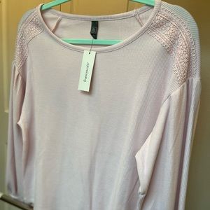 Francesca’s pink sweater